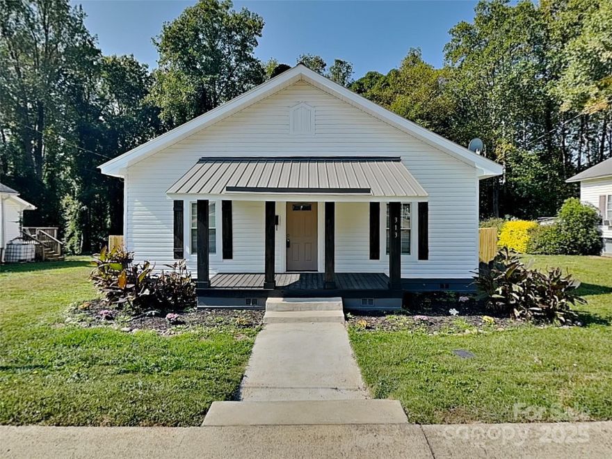 Welcome home to this remodeled property in Mooresville Mill Village! Step inside to a move-in ready home with fresh paint, updated flooring in most rooms, and brand new stainless steel appliances! The kitchen also boasts new shaker cabinets with a quartz countertop and undermount sink. The primary suite features a generously sized room and walk-in closet with an updated en-suite including a new tiled shower and stylish vanity with new hardware. Enjoy the outdoors in the spacious, fully fenced backyard, perfect for entertaining family and friends. Schedule your visit today!