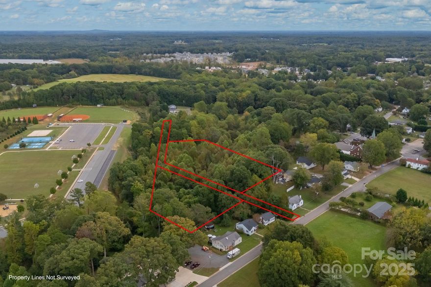 Beautiful in town acreage that borders ESC park. Wooded acreage with a stream and public right of way access from Patterson and Bradburn. The land was timbered approximately 23 years ago. A haven for wildlife and conveniently located, the previously platted acreage with sewer access offers multiple opportunities. Dreamers bring your vision and build your own private estate. Developers willing to bide your time, this is a great opportunity! Wildlife buffs? Townies? Don't miss this opportunity to position yourself in the heart of Troutman!
