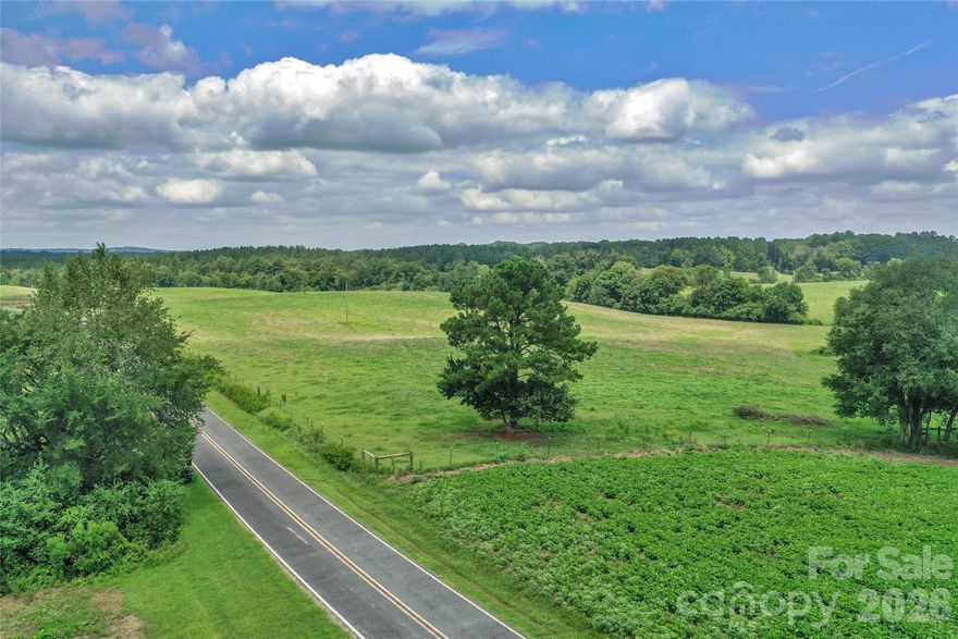 Open 11+ Acres in the highly desired countryside of Marshville, Union County! Private lot for your custom dream home. If you are interested in the country lifestyle, a large peaceful homestead, and farm views, this is the land for you! Easy access to Charlotte, New Salem, Monroe, grocery stores, gas stations, other modern amenities. Right down the street from Eagle Chase Golf Club. There are hundreds of feet of paved road frontage. This private lot already has a fence at the street and the eastern border. This landscape provides a peaceful homesite with long-range country views. Majority of the land is cleared for your future build and other recreation / farming activities. With the large lot size, pursue building your dream home, use this land for your farm, garden, equestrian activities, and other outdoor activities. **More land available for sale** RA-40 zoning. Survey is recorded and available.
