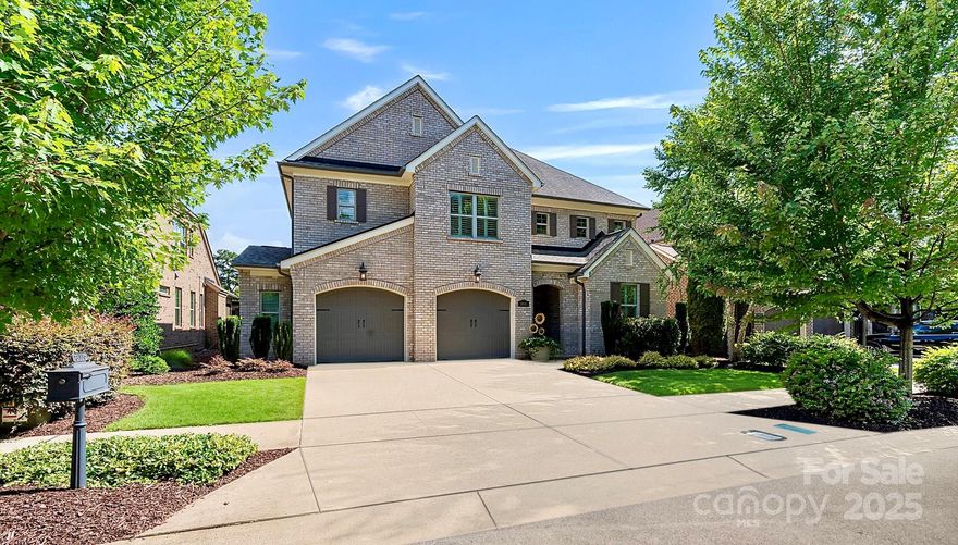 This exquisite Cornelius home in vibrant Robbins Park offers the best of Lake Norman living and fabulous amenities, all within walking distance to shops, parks, and boating. Nestled on a quiet, tree-lined street offering a peaceful setting, this impeccably maintained property boasts lush, manicured landscaping, charming Bermuda shutters, and private screened-in porch opening to a beautiful paver patio—perfect for outdoor entertaining. Inside, the home features a chef’s kitchen with large island, gas range, extensive cabinetry, and flex space ideal for a home office or scullery. Other main level features include a sunny dining room, living area with cozy fireplace, and guest suite adding convenience and flexibility. Upstairs, a spacious primary retreat and spa bath with separate vanities, soaking tub, glass shower, and dual walk-in closets with direct access to laundry room. Enjoy three additional bedrooms up plus an open loft/bonus area providing plenty of space for family and guests.