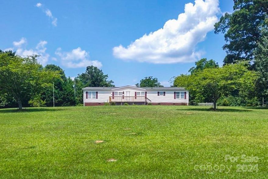 Welcome to your own private oasis on 38.5 acres of pristine countryside! This 3 bedroom, 2 bathroom home offers the perfect blend of modern comfort and rural charm. Enjoy the convenience of a 30x50 metal detached garage with 3 large entry doors and a fully functional RV hookup, ideal for hobbyists or outdoor enthusiasts. Explore the picturesque landscape via several tranquil paths that wind through the property, leading to delightful surprises like a chicken coop and lush gardens boasting pecan trees, blackberries, peach trees, and grapevines. With appliances just 3 years old, this property promises functionality. Don't miss the opportunity to make this exceptional retreat your own slice of paradise!
