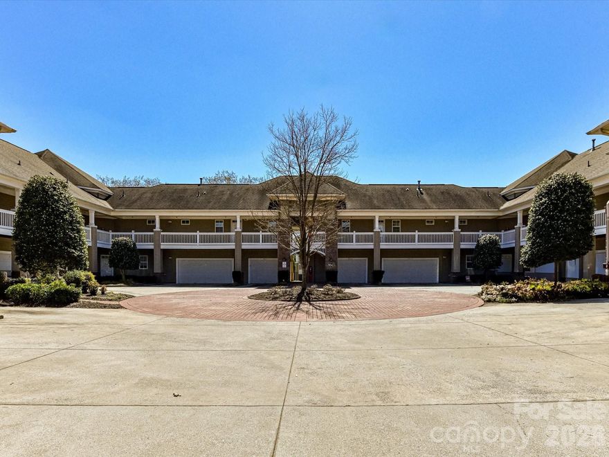 Peaceful retreat & perfectly located, 3 Bedroom, 2 Bath Condo with 1 Car Garage & huge, covered, wrap around porch, nestled in the heart of Cornelius! Charming Courtyard layout & lush surroundings await you. This open, bright plan has nice flow from room to room. The upgraded Kitchen features granite counters, stainless steel appliances, breakfast bar, tile back splash, plenty of cabinetry for storage, pantry & dining area. Living Room offers a cozy gas fireplace, hardwood floors & access to a covered patio. Large Primary Bedroom with tray ceiling, ceiling fan, great natural light, private bath & walk in closet. Primary Bath with dual vanity, large garden tub, separate shower & tile floors. 2 additional bedrooms with ceiling fans. Full Bath features tile surround tub/bath & tile floors. Community & building features include: Pool, Club House, ELEVATOR & Greenway walking trails! Close to Lake Norman (just across street), Jetton Park, Birkdale Village, restaurants, entertainment & I-77. Edinburgh Square is a rare gem with peace, privacy yet every convenience closeby.