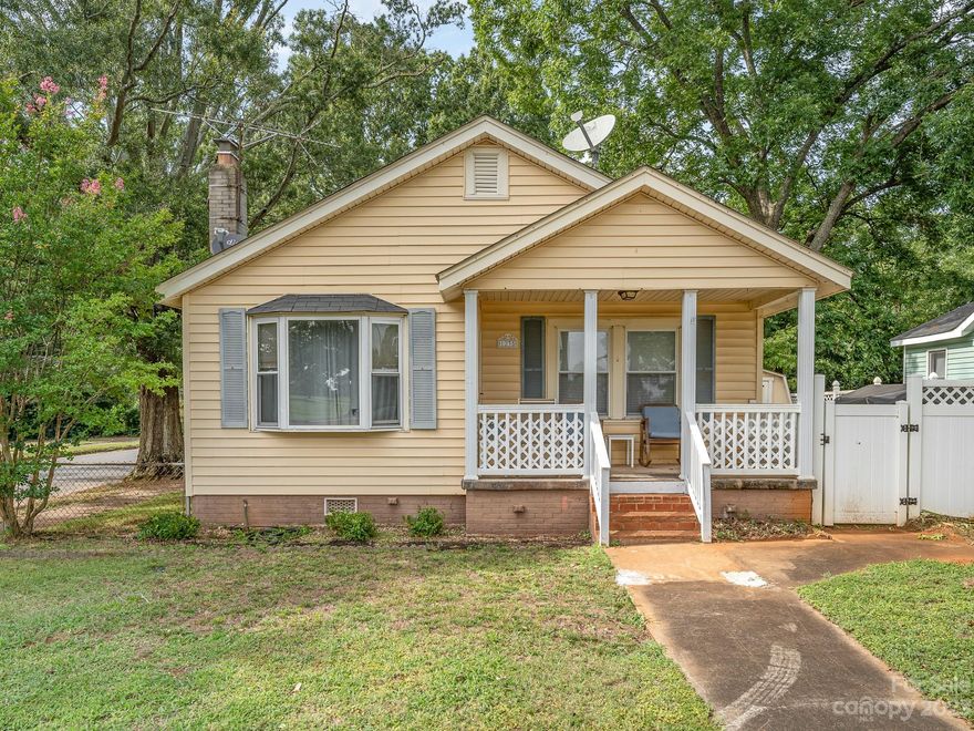 Double Lot in Rock Hill near Winthrop Univ.  2 bed 1 bath bungalow with tons of potential.  Home sits on the Corner of Eden Terrace and MacArthur.  Property has 2 structures. There is a second structure on the property that has a separate mailing address and has window units for heating and cooling. Property sits across the street from Winthrop Coliseum.