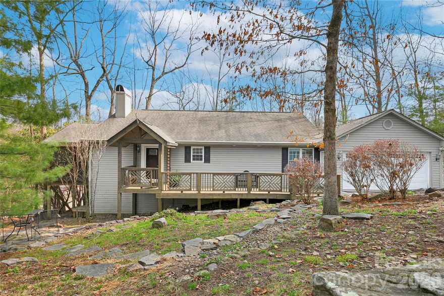 Welcome to easy one-level living in beautiful Connestee Falls! This light-filled 3-bedroom, 2-bath home feels like a breath of fresh mountain air, with a cozy screened-in porch and wraparound decks perfect for relaxing or entertaining. The updated kitchen and bathrooms make everyday living a delight, and a private walking path takes you straight to the pickleball courts, pool, and clubhouse. Conveniently located close to downtown Brevard, this home is ideal for full-time living, a weekend getaway, or a great rental opportunity.  There is also an outside shed as well as almost 500 square feet of finished storage unit on lower crawl space level  Connestee Falls offers a gated community with 4 mountain lakes, 20 plus miles of hiking trails, pickleball, bocce ball, tennis courts, walking track, 26,000 square foot clubhouse with 3 restaruants as well as a George Cobb designed 18 hole championship golf course.  New members to Connestee Falls pay a one time amenity reserve fee of $14,000 when paid at closing.  Schedule your showing today and see why we live where we play!