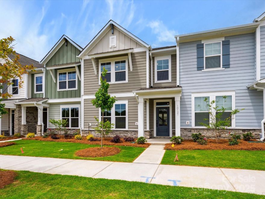 Welcome to this charming middle-unit townhome, offering both comfort and style in every detail. The main floor features a convenient bedroom and full bath, perfect for guests or as a private home office. The spacious kitchen boasts sleek white cabinets and beautiful quartz countertops, creating a bright, inviting space for cooking and entertaining. Upstairs, the large primary suite serves as a true retreat, complete with plenty of room to unwind and relax. Outside, enjoy the fresh air on the covered porch, ideal for outdoor dining or simply enjoying the view. With its modern design and thoughtful layout, this home offers a perfect combination of practicality and elegance.