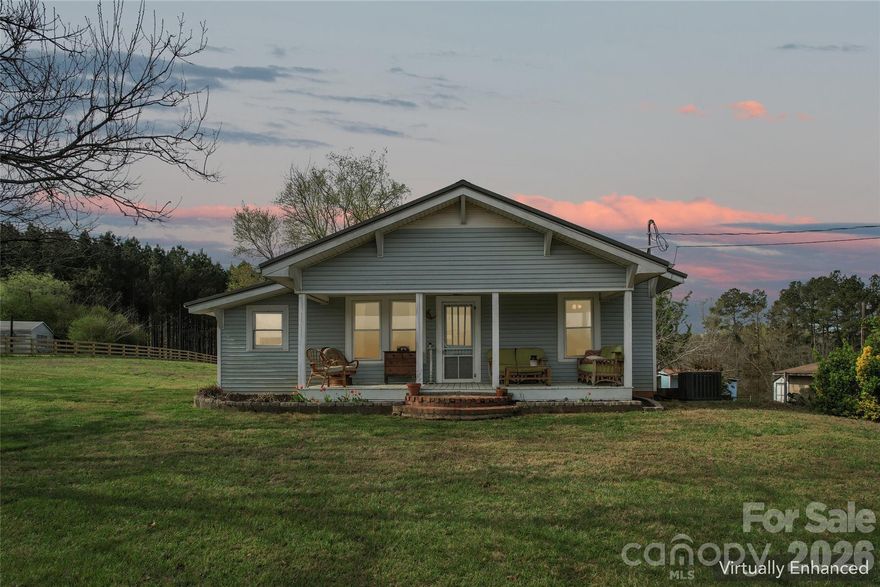 Welcome to your private farmhouse retreat on over 3 fully fenced acres, where peaceful country living meets thoughtful upgrades and endless possibility, a rare opportunity to own the perfect homestead property. From the moment you arrive, you’ll feel it. A beautiful entry lined with roses welcomes you home, bursting into bloom in the summer and setting the tone for what lies beyond. Step onto the property and take in the breathtaking views of a neighboring pond and open pasture, creating a setting that feels like a dream and lives like one every day.
This home has a top of the line custom built fence, featuring reinforced 2x6 construction and cemented posts for long term durability and peace of mind. At night, the front fencing is beautifully lit, casting a warm glow across the property.
The land is ready for your vision, whether that includes horses, farm animals, or simply wide-open space to enjoy. You’ll also find a variety of mature fruit and nut trees, including pecan, peach, pear, cherry, mulberry, and fig, along with an asparagus bush.
As you walk inside, the home blends charm with extensive upgrades. A newly added sunroom filled with windows offers the perfect place to relax and take in the surrounding views year-round. If cooking is a passion, this kitchen will truly feel like the heart of the home. Thoughtfully updated just a few years ago, it features beautiful butcher block countertops, a stunning stove, and a charming farmhouse sink that perfectly complements the home’s character. With two full-size refrigerators side by side, you’ll have all the space you need for entertaining, meal prep, or everyday living. The home has been thoughtfully improved with numerous updates, including new windows, HVAC system, septic and well system, whole-house water filtration, and freshly cleaned air ducts, providing comfort and confidence for years to come.
The basement offers incredible flexibility, featuring a workshop area, garage space, and abundant storage.
Additional structures on the property add even more versatility: a barn, chicken coop and a second outbuilding perfect for a she-shed, man cave, playhouse, or private retreat space.
For those with recreational vehicles or additional needs, the property is also equipped with a 50-amp RV hookup.
Whether you’re looking to create a hobby farm, enjoy quiet mornings overlooking the water, or simply have space to live freely, this property delivers a lifestyle that’s hard to find. 
Opportunities like this don’t come around often. The land, the views...it feels like something out of a Hallmark movie. Schedule your showing and experience it for yourself!