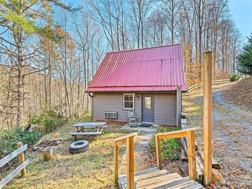 Gorgeous little cabin on 13.554 private acres with creek and an additional homesite cleared and graded for your future big house OR would make a nice place to park an RV. ATV trails throughout the property with great access to the creek. Private location yet not too far from town. Two miles to I-40. Quick access to Asheville, Waynesville, Maggie Valley or Tennessee. Only 5 miles to The Cataloochee Valley of the Great Smokey Mountains National Park. Wildlife including elk, deer, turkey and bear frequently seen on the property. Don't miss this chance to own your perfect mountain getaway without being too far out.