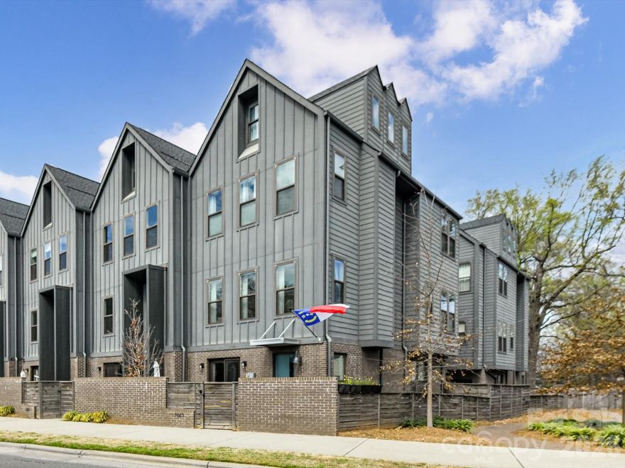 With 2,465 sq ft are you seeking SPACE in a prime location? Look no further — this is the ONE!

Perfectly situated in the heart of Villa Heights in Charlotte’s sought-after Circuit District, this gorgeous end-unit townhome offers the ultimate location.  Enjoy close proximity to some of the hottest restaurants, shopping and nightlife in Plaza Midwood, NoDa, Belmont, Optimist Hall, and Uptown.  Just minutes from the light rail, trolley, and the greenway—what more could you ask for.....wait, also, just steps away from one of Charlotte’s newest hotspots, Mezzo Market.  Yes, Please! Live your best car-free lifestyle right here.  

Inside, you’ll find a light-filled, beautifully appointed home with soaring ceilings throughout and noise-reducing windows, offering peace and quiet while being in the center of it all. The spacious kitchen boasts an oversized island and abundant cabinetry, flowing seamlessly into the open floorplan — ideal for both everyday living and entertaining.

Thoughtful updates include fresh paint throughout, a stunning, updated half bath featuring custom board and batten and wallpaper, updated high end designer lighting, and stylish mirrors throughout much of the home. Step outside to your fully fenced outdoor retreat complete with a custom hardscaped patio and side yard — perfect for gardening, relaxing, or your four-legged friends.

Additional highlights include: 3 bedrooms plus a dedicated office, side-by-side 2-car garage, custom up/down window treatments throughout much of the home, water included in the HOA fee, and an abundance of natural light from end-unit positioning

Don’t miss this Villa Heights dream — where location, lifestyle, and comfort come together seamlessly.
Showings begin on Friday, March 13th.  Parking available on Barry St. and Lola Ave.

Assumable loan $450K at 4%