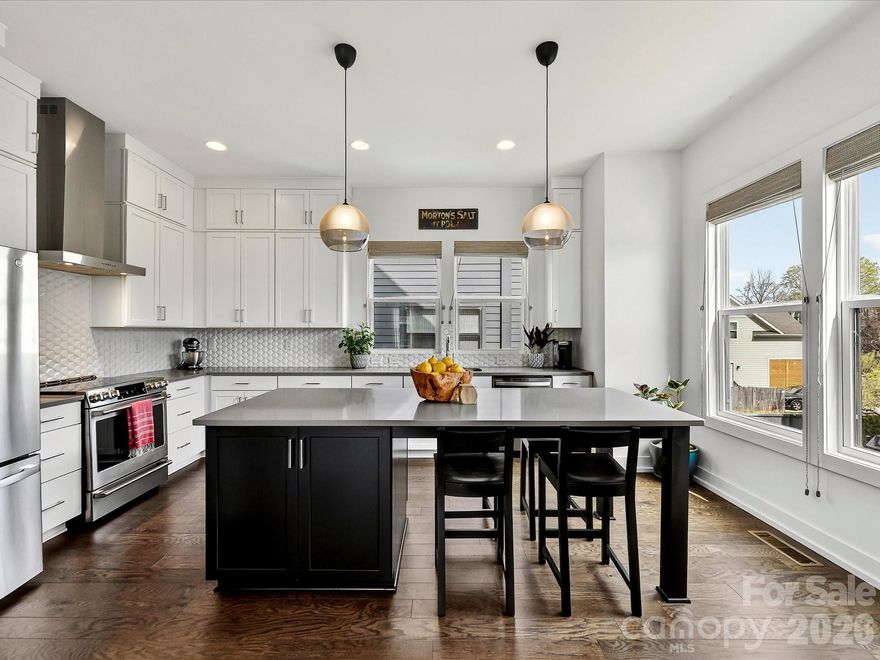 With 2,465 sq ft are you seeking SPACE in a prime location? Look no further — this is the ONE!

Perfectly situated in the heart of Villa Heights in Charlotte’s sought-after Circuit District, this gorgeous end-unit townhome offers the ultimate location.  Enjoy close proximity to some of the hottest restaurants, shopping and nightlife in Plaza Midwood, NoDa, Belmont, Optimist Hall, and Uptown.  Just minutes from the light rail, trolley, and the greenway—what more could you ask for.....wait, also, just steps away from one of Charlotte’s newest hotspots, Mezzo Market.  Yes, Please! Live your best car-free lifestyle right here.  

Inside, you’ll find a light-filled, beautifully appointed home with soaring ceilings throughout and noise-reducing windows, offering peace and quiet while being in the center of it all. The spacious kitchen boasts an oversized island and abundant cabinetry, flowing seamlessly into the open floorplan — ideal for both everyday living and entertaining.

Thoughtful updates include fresh paint throughout, a stunning, updated half bath featuring custom board and batten and wallpaper, updated high end designer lighting, and stylish mirrors throughout much of the home. Step outside to your fully fenced outdoor retreat complete with a custom hardscaped patio and side yard — perfect for gardening, relaxing, or your four-legged friends.

Additional highlights include: 3 bedrooms plus a dedicated office, side-by-side 2-car garage, custom up/down window treatments throughout much of the home, water included in the HOA fee, and an abundance of natural light from end-unit positioning

Don’t miss this Villa Heights dream — where location, lifestyle, and comfort come together seamlessly.
Showings begin on Friday, March 13th.  Parking available on Barry St. and Lola Ave.

Assumable loan $450K at 4%