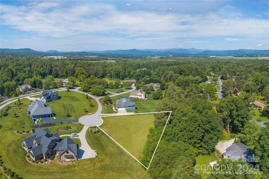 Welcome to beautiful Skytop Farm situated on a gently laying, lush landscape with top notch neighborhood amenities including river access, clubhouse, pool, pond, putting green, walking trail and gated entry!  All within minutes to Hendersonville, Asheville and Brevard.  Well-regarded area schools are nearby as well!  You are also within a short drive to the beautiful hiking, biking and access of the Pisgah National Forest.  This easy access, cul-de-sac lot awaits your dream home in the mountains of western North Carolina.  Skytop Farm has an architectural review process in place for new construction.  Existing 4 bedroom private septic permit expires in October 2025. Call for more information or to arrange a showing.