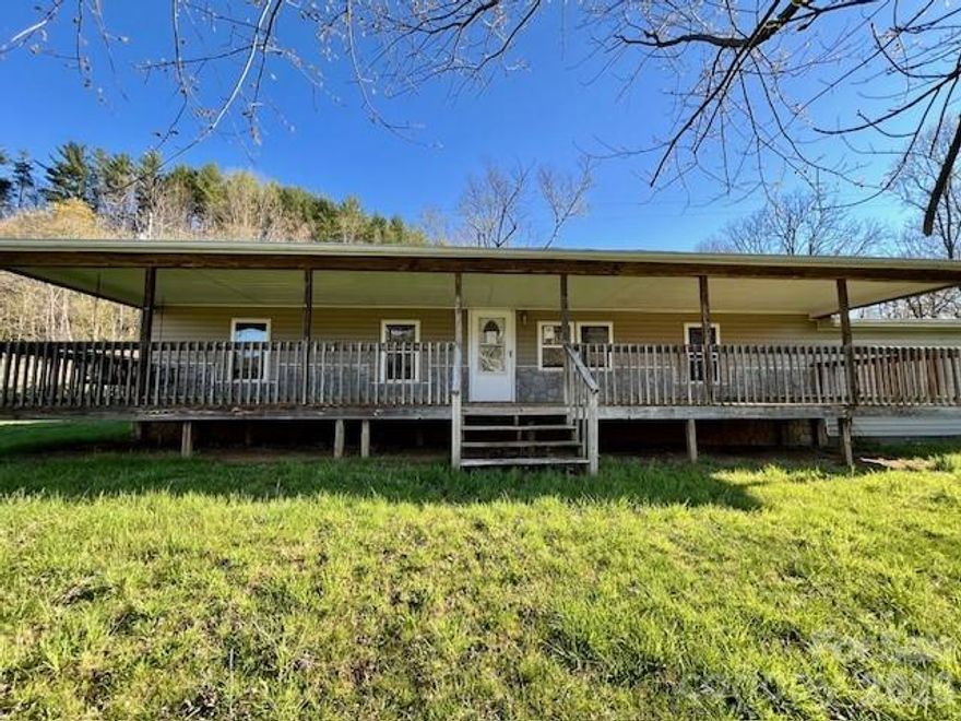Tucked away in the beautiful mountains of Burnsville, NC, this 2-bedroom, 2-bath home offers a rare opportunity to create your own mountain retreat. Enjoy close-range mountain views from the large covered front porch, the perfect spot for morning coffee or evening sunsets surrounded by fresh mountain air.

Inside, the home features a spacious den filled with natural sunlight, creating a warm and inviting space ideal for relaxing, entertaining, or setting up a home office. This house is ready for finishing touches, giving buyers the freedom to select their own flooring and paint colors to truly make it their own. Both bedrooms offer comfortable space, and the two full bathrooms add convenience for everyday living or hosting guests.

Out back, a small fenced-in yard provides a great area for pets, gardening, or enjoying a quiet moment outdoors. Whether you’re looking for a full-time residence, a vacation getaway, or an investment property, this home presents an exciting opportunity to customize and add value in a peaceful mountain setting.

Bring your vision and turn this Burnsville gem into the mountain home you’ve been dreaming of!