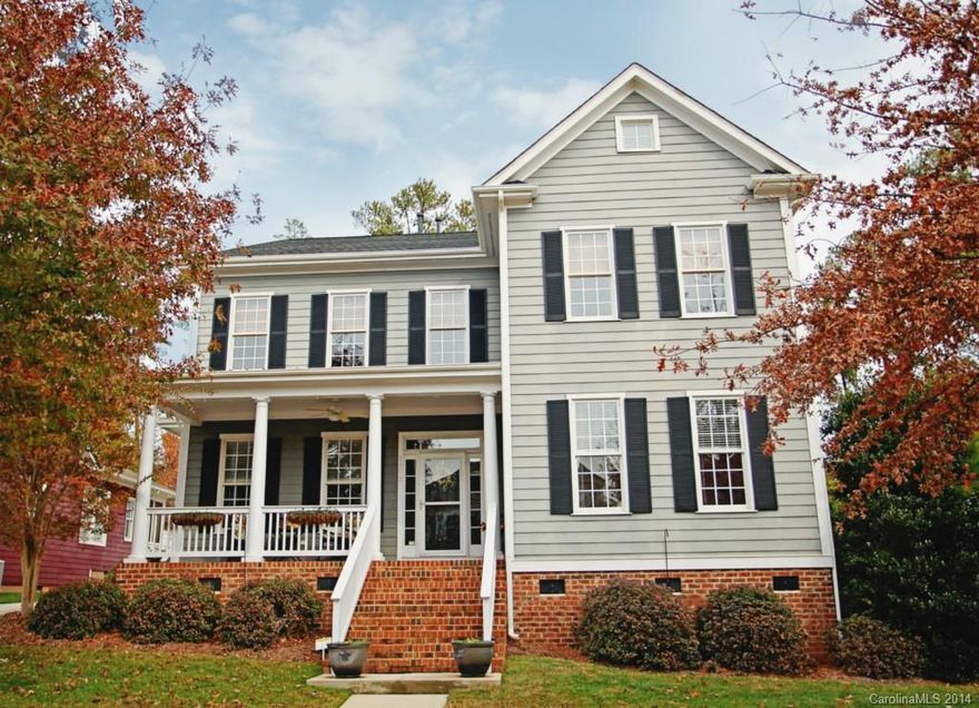 Wow! This GORGEOUS Home w/Southern Front Porch Flows w/Style, Comfort & Grace! Beauty at every turn: hardwoods, millwork, arches, wainscoting, columns, & high ceilings. GOURMET Kit w/Work Island, Double Breakfast Bar, Breakfast Area & Butler’s Kitchen w/granite. GE Profile SS appliances, tile back splash, upgraded electric range w/warmer settings. Elegant Master on main w/bayed sitting area & jetted tub. Versatile Loft!  Set in amenity rich Baxter, walk to shopping, restaurants & more!