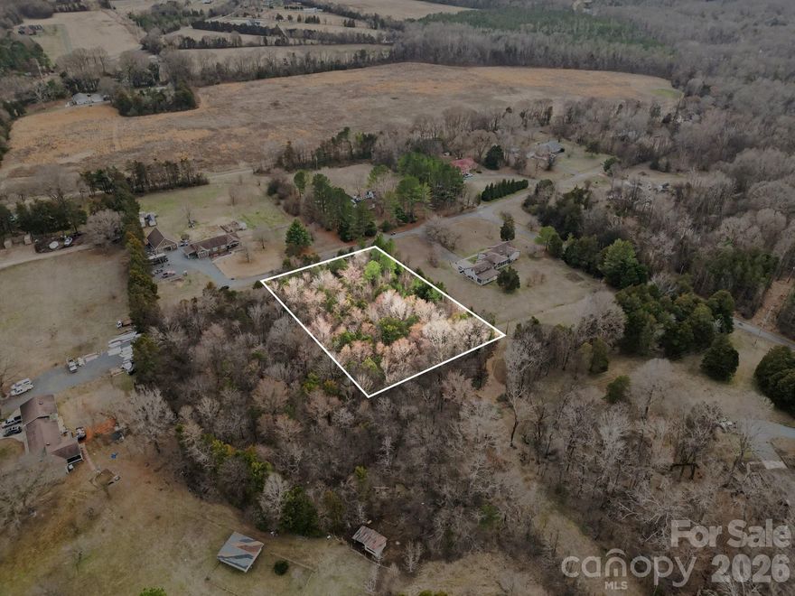 Rare opportunity to build your dream home in the desirable Harrisburg area! Situated on 1.72 acres, this property offers the perfect blend of a peaceful, rural setting with endless possibilities to create your ideal home. The land is flat and ready for your vision, with a survey available for your convenience. Buyer responsible for perk test. Don’t miss the chance to turn your dream into reality—start building today!