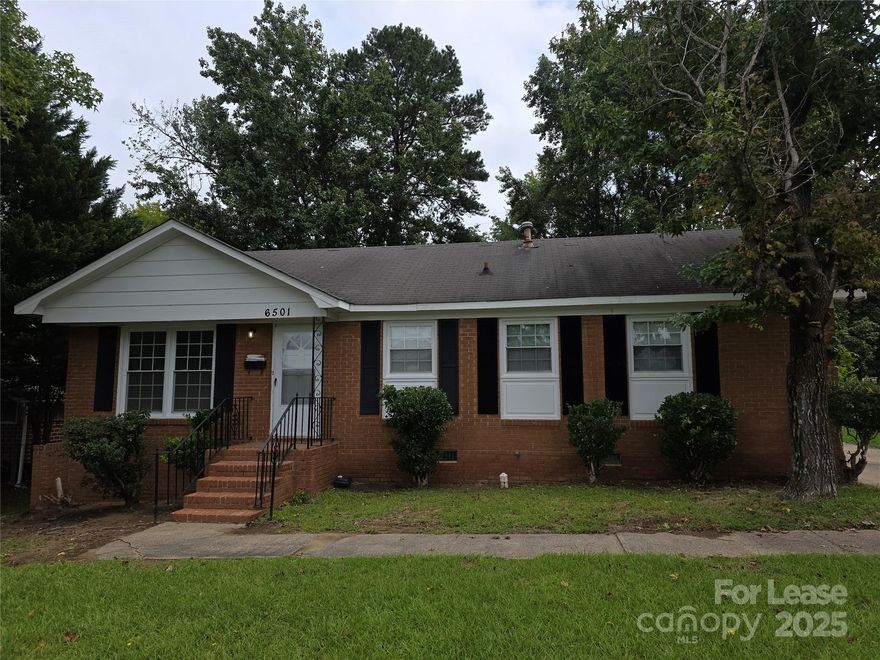 Three bedroom brick ranch style home with 1 1/2 bathrooms, den, kitchen appliances, laundry connections in laundry room, new LVP flooring throughout, Gas Heat, Central Air and nice level yard.