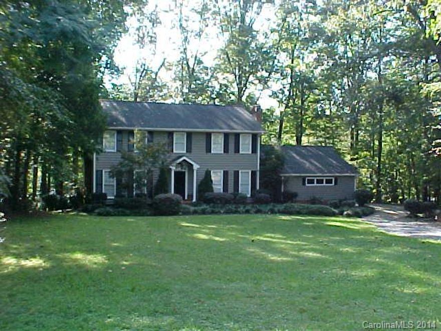 Totally remodeled and updated 5 BR, 3.5 Ba traditional on almost 2 acres in neighborhood of expensive upscale homes. Great location inside Hwy 51 close to all kinds of amenities and great schools. Three fireplaces, main floor office w/full bath could be 6th BR. Formal LR & DR, Fam rm w/frpl, Finished basement w/pool table & frpl. Chef's kitchen w/Island and upscale appliances. Large Deck and Patio overlooking private wooded backyard great for entertaining. Circular drive. Move in ready!!!