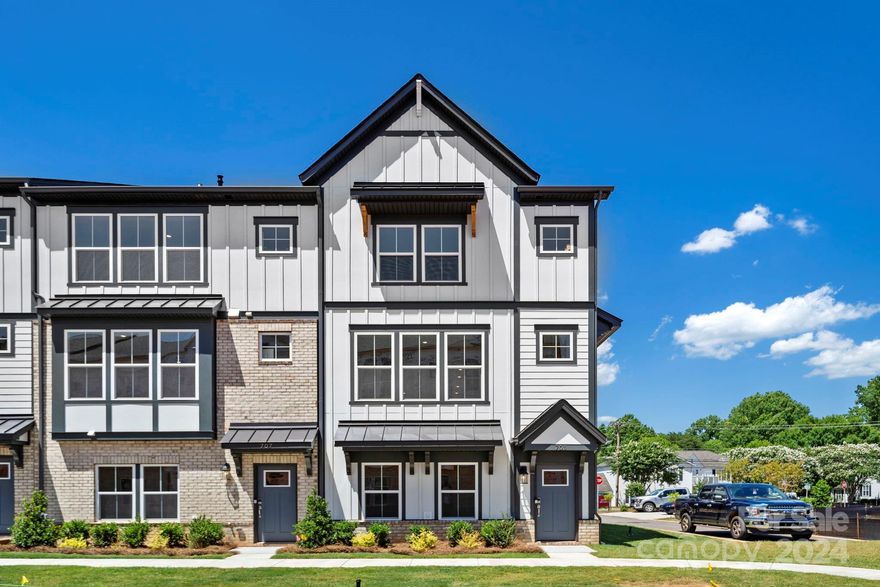 MLS#4134759 REPRESENTATIVE PHOTOS ADDED. Early Summer Completion! The Vail II townhome in Davidson offers three levels of contemporary living. The ground floor features a two-car garage and a versatile room with a full bath. On the second floor, an open layout connects the gathering room, dining area, and gourmet kitchen, leading to an outdoor deck. A powder room adds convenience. Upstairs on the third floor, all three bedrooms, including a lavish primary suite with a spacious walk-in closet and elegant master bathroom, are found, with laundry conveniently situated nearby. Overall, the Vail II townhome seamlessly blends practicality with luxury in the desirable Davidson area with the ability to walk to restaurants, schools, stores, and downtown Davidson. Structural options include: full bath on first floor, modern linear fireplace in gathering room, shower ledge in owner's bath.