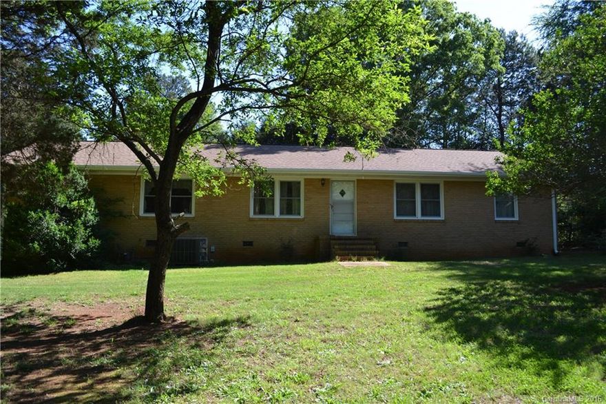MULTIPLE OFFERS-HIGHEST & BEST due FRIDAY 9/8/16 by 5 p.m. Charming ranch on 1.26 acres close to Lake Wylie, shopping, I-485 & I-77.  Beautiful lot w/tons of trees! Home offers 3 bedrms, 2 full bathrms, large kitchen & dining rm plus a living rm & den. Lots of space to spread out. Need outdoor workspace? This home has it, carport attached to home, a separate car port plus a 3 bay outbuilding/storage area. SOLD "AS IS"