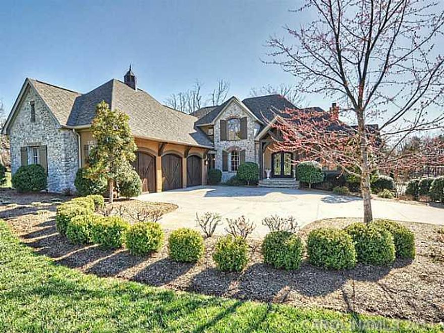 Secluded Waterfront Gem.Vaulted GR with beamed ceiling open to Cooks Kitchen. Butler kitchen off main Kitchen great for entertaining. Screened porch w/ water fall and stone FP. Bonus Rm up has built in desk/study area wet bar and craft cabinets. Lake Level with Kitchen, Rec Area, Theater, exercise and Flex room. Infinity Pool , gas fire pit with built-in seating & full Covered Outdoor Kitchen.