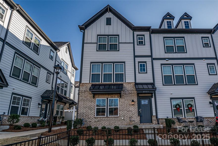 Welcome to this newer, modern three-level townhome featuring all the bells and whistles! Enjoy the convenience of a private two-car garage and thoughtful design throughout.  The first floor offers a versatile flex space—perfect for a home office, gym, or guest area—along with a full bathroom, additional storage, and direct access to the garage.  The second floor showcases a bright, open-concept living and kitchen area, ideal for everyday living and entertaining. The kitchen features a gas cooktop with built-in oven and microwave, and all appliances convey for tenant use, including the refrigerator, washer, and dryer. The living room includes a cozy gas fireplace, and a charming balcony off the kitchen provides the perfect spot for morning coffee or evening cocktails.
The third floor is home to the spacious primary suite, complete with a beautiful, oversized bathroom. Two additional bedrooms and a full bathroom complete this level.  Located in a conveniently situated community close to shopping, dining, and major roadways—this home combines modern style with everyday comfort.