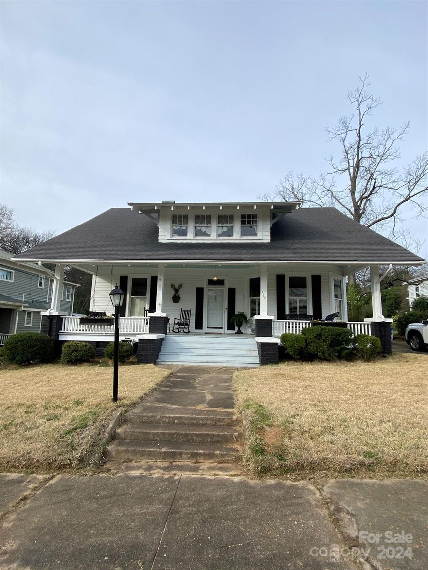 Historic and elegant 1920's remodeled home in beautiful Wadesboro. Gorgeous wood floors, awesome floor plan with four bedrooms and two full baths. Primary bedroom/bath, kitchen, laundry, dining, living and flex room are all on the main level. Upstairs includes three spacious bedrooms and full bath. Circle driveway makes it easy for guest to come and go. Extra lot included! Awesome space for gardening etc... Home was painted in the spring of 2021 and is gorgeous. Inside pictures coming soon to show how beautiful the interior is also.