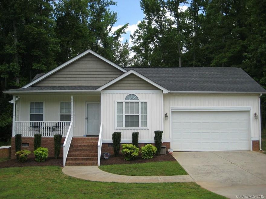 Adorable home with wood flooring throughout main living area; vaulted ceiling in great room and bedroom; large laundry room conveniently located next to garage entrance; flex space attached to master bedroom perfect for sitting area, nursery or additional closet/storage space; ceiling fan in great room and all bedrooms; wooded area behind home and on empty side lot provides complete privacy and tranquility; low SC taxes; desirable schools; convenient to everything!