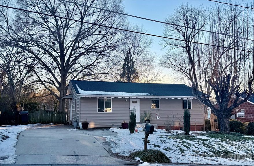 This delightful 988 square foot home, built in the 1960s, has been beautifully updated for modern living. It is a 2 bedroom home, but seller divided the second big bedroom into 2 bedrooms (this addition is unpermitted).  Full bathroom and a convenient half-bath is located near the laundry room.  Seller is in process of getting this nice additional half-bath permitted. The home boasts a brand new roof from 2025, new insulated windows, laminate flooring throughout (no carpets!), and elegant granite countertops.  Additional upgrades include new ceiling fans and modern appliances. The backyard is a serene retreat and fully fenced for added privacy.   Also take advantage of $5000 in seller paid Concessions. Buyer can use it to lower the interest rate or cover closing expenses.  This credit gives the buyer flexibility and savings to keep more cash in your pocket at closing! Motivated Seller!