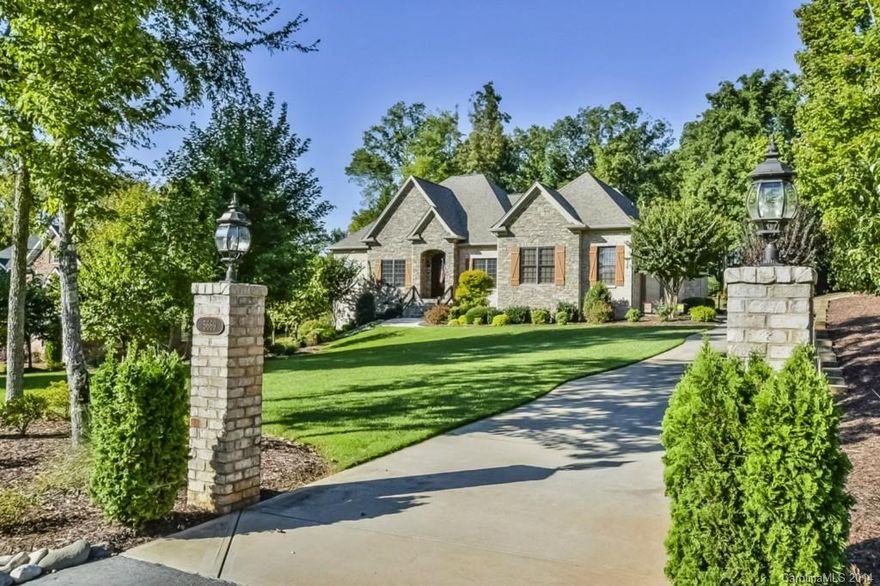 GRAND Elegance Glows from this beautiful RANCH with Back Yard Salt Water Pool Oasis! Carefully designed by owners & architect - Custom to the "T."  Private acre setting.  Featuring: Grand millwork, 10’ ceilings, 8' doors, rounded corners, solid wood cabinetry.  GORGEOUS Chef’s Kitchen; cooktop with down draft.  Luxurious Master Suite with heated tile flooring. AMAZING Soaring Screened Porch with cable TV & fireplace. Whole house audio including poolside.  Easy Charlotte & Airport access!