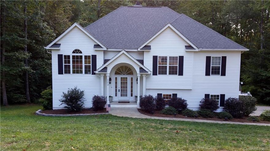 Beautiful inviting home from the moment you enter the front door! Raised ranch with soaring ceilings & unique features. Enjoy entertaining in open design great room with fireplace, kitchen with bar area & dining room. Owner's suite offers tray ceiling, dble vanities, jetted tub, sep shower. Lower level bonus room is a perfect spot for relaxation or entertaining. Enjoy outdoor living in complete privacy on the huge deck, covered patio or by the firepit! Secluded wooded cul-de-sac acre lot!