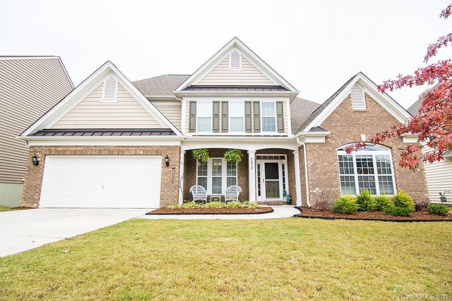Stunning, popular floorplan in desirable Belair at Carolina Lakes. Hardwoods on main, two story great room, gourmet cabinetry, granite countertops, covered porch addition in rear. Wooded lot. Four bedrooms and a large bonus. Extra storage space. Master on main!