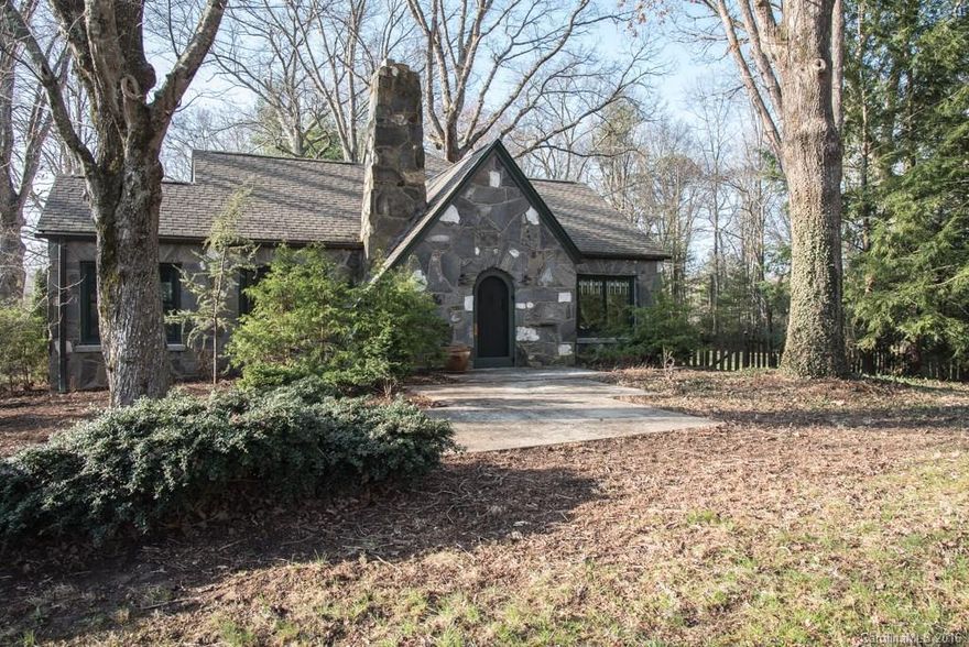 Stunning stone cottage with gorgeous mountain views from every window on a park-like setting. A classic bungalow exquisitely updated, expanded and maintained. Its original Arts and Crafts character is beautifully preserved and enhanced in the 3 front rooms which lead to a wide open kitchen and family room, and upstairs to a luxuriously spacious master suite. Add 2 bedrooms/baths with new high-end fixtures, a deck, patio, garage, and through the trees, a charming 2 bedroom guest cottage.