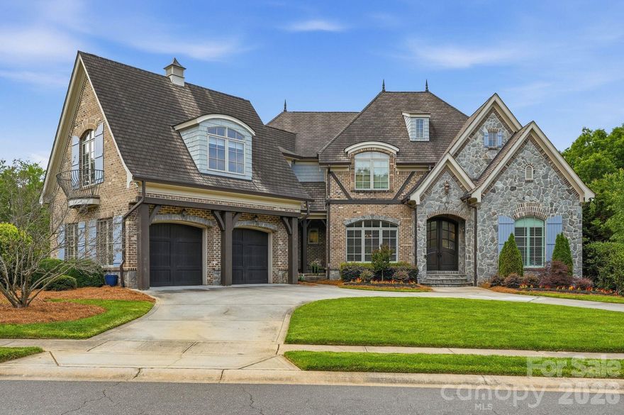 Exceptional almost 8,000 sq ft home in the desirable Stonecroft neighborhood, spanning three levels with 6 bedrooms, 5 full, 2 half bathrooms, and situated on over half an acre. Designed for both everyday living and entertaining, this property features dual 2-car garages and extensive upgrades throughout, including a 2024 renovated kitchen and bar area with high-end appliances, remodeled home office, oversized pantry with Dutch door, and flooring replaced throughout many areas of the home. Several bathrooms have also been updated. The incredible outdoor living space has been transformed with a fully renovated heated saltwater pool, extensive hardscaping, fire pit, dedicated dog run, and renovated sport court. Enjoy multiple outdoor gathering spaces including a screened porch with fireplace, upper-level grilling patio, covered porch with dual-sided fireplace, and an outdoor kitchen beneath a pergola complete with built-in grill, flat top griddle, refrigerator, and sink. Additional improvements include new gutters and a spiral staircase connecting upper and lower outdoor living areas. Located near the popular SouthPark area with premier shopping and dining, top-rated schools, convenient highway access, and close proximity to the airport.
