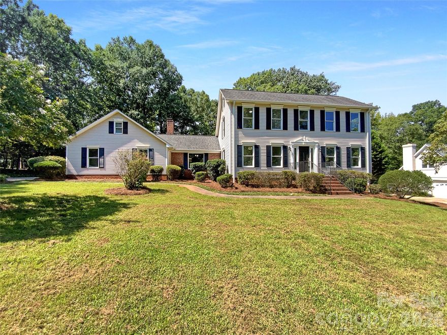 Welcome to this move-in-ready home in picturesque Hickory Estates, offering great curb appeal, fresh interior paint, and a warm, neutral palette throughout. With 5 bedrooms and 3 full baths, the layout is both spacious and functional, including a convenient first-floor guest bedroom and full bath—perfect for visitors or multigenerational living. Inside, enjoy comfortable gathering spaces highlighted by a cozy fireplace, plus a bright sunroom that adds extra flex space for relaxing, working, or entertaining. Step outside to a large patio overlooking a nearly one-acre lot—ideal for outdoor dining, play, gardening, or simply enjoying the peaceful setting. This home blends comfort, space, and ready-to-enjoy charm in a sought-after neighborhood. Included 100-Day Home Warranty with buyer activation