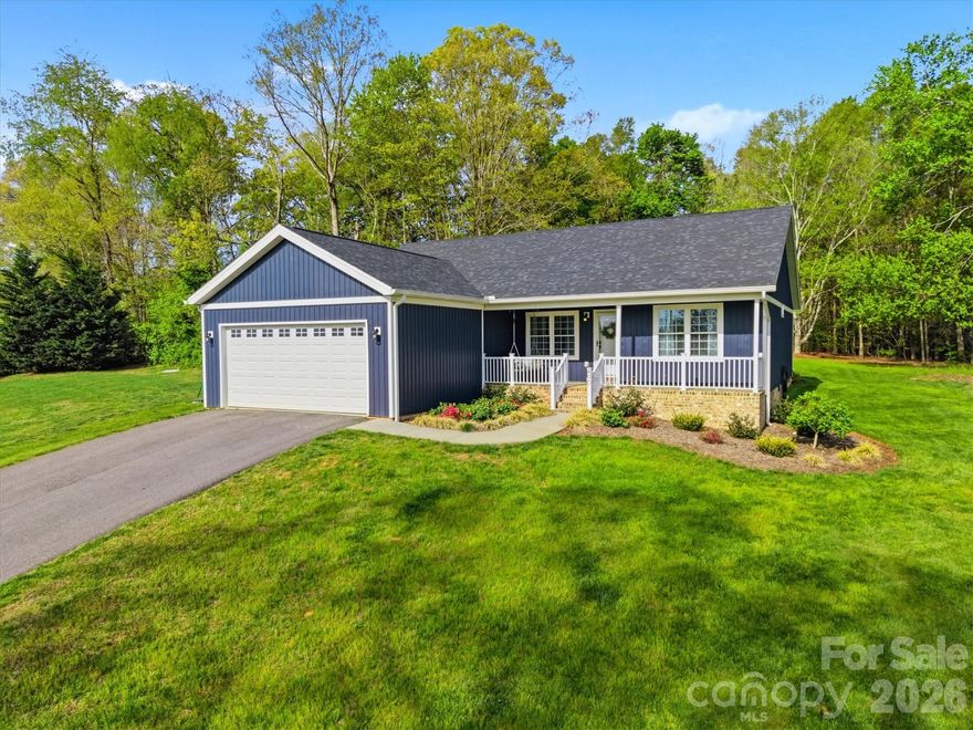 "Modern Living Meets Rural Freedom! Skip the small subdivision lots and the restrictive HOAs. Built in 2021, this stunning 3BR/2BA ranch sits on a sprawling .78-acre lot, offering the perfect blend of contemporary style and countryside privacy.
Inside, you'll find a bright, open-concept floor plan with soaring ceilings and premium finishes that still feel brand new. The spacious kitchen flows seamlessly into the living area, making it ideal for entertaining. Outside, the expansive .78-acre parcel is a blank canvas—perfect for those who want space for a garden, a detached shop, or just a quiet evening on the deck.
Located just minutes from the amenities of Granite Falls and the recreation of Lake Rhodhiss, you are perfectly positioned between the convenience of Hickory and the beauty of the Blue Ridge foothills. Why pay more for a smaller lot in a crowded development? Welcome home to 490 Dudley Shoals Rd."