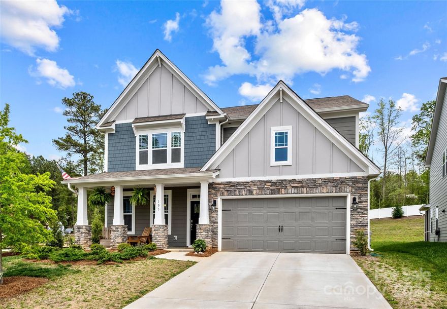 Enjoy this lakefront community, featuring exclusive lake access via a canoe/kayak launch. Amenities include a pool, walking trails, playground, pocket parks & clubhouse with a fitness center. Step inside this stunning home, where the formal dining room leads into a well-equipped butler’s pantry and breakfast bar. The open floor plan features a family room with a gas fireplace. The main level includes a guest suite & full bath. The gourmet kitchen is a chef’s delight with stainless steel double ovens, a gas cooktop, and quartz countertops. Abundant storage is available throughout, ensuring that every space is as functional as it is beautiful. The second floor hosts a loft, ideal for relaxation, and a luxurious primary suite with a large walk-in closet and a spa-like bathroom. Enhancements include smart home technology, and an energy-efficient tankless water heater. Situated on a serene, tree-lined corner lot, this home is surrounded by scenic views & vibrant community life.