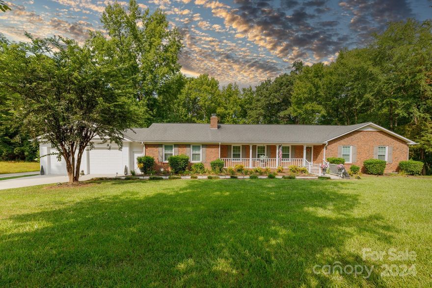 This charming one-story home is nestled on a beautiful 1.5 acre lot, offering private living and an inviting in-ground pool, perfect for relaxation and outdoor entertaining.  This home has been lovingly maintained and features two large family rooms, both with gas fireplaces.  Gorgeous Kitchen with granite island and countertops that opens to screened deck and pool.  Nicely sized Primary with updated bath.  Remaining bedrooms are spacious with great closet space.  Huge laundry room with cabinets, sink and storage closet.  Additional home amenities include encapsulated crawlspace with dehumidifier, electric hookup for a camper or car, generator hookup and a natural gas connection for outdoor grill.  Schedule your personal tour today!