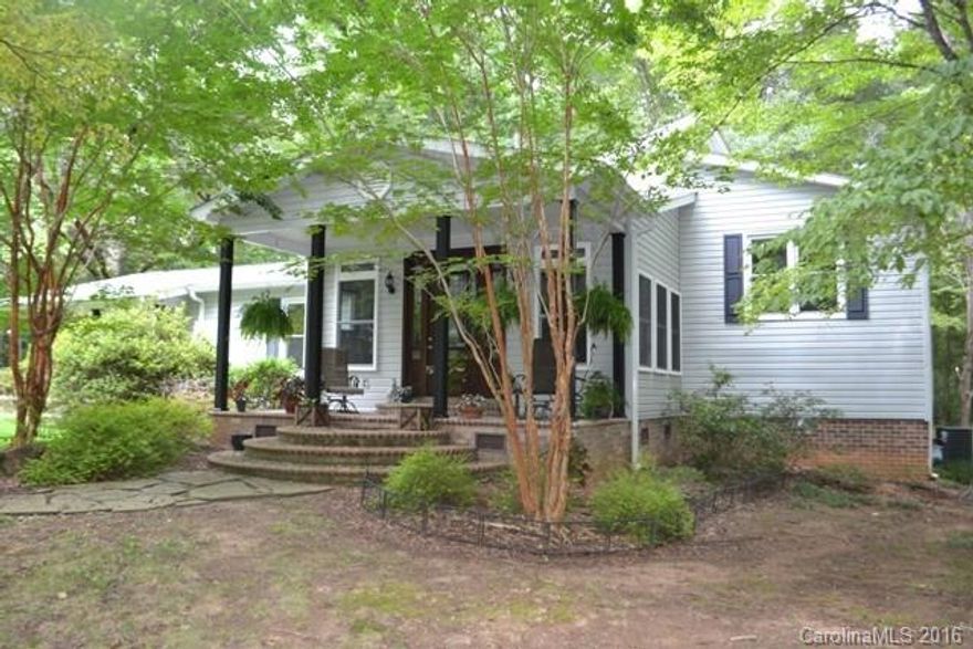 Fabulous home situated on a large 8.5 acre lot! This lovely home is located near Catawba and features vaulted ceilings w/ exposed beams as well as beautiful hardwoods throughout main living areas. Huge screened porch, deck, and walk out crawl space. Large wired workshop has single carport w/ lean to. Private seclusion, amazing 200 year old oak tree, six mile creek runs across property line, and many other views of mother nature right in the backyard. Country living made easy!