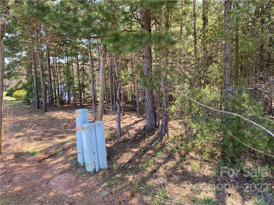 PRICE REDUCED TO WELL BELOW TAX VALUE.  Nice corner lot on Buck Oak Road just off Buffalo Shoals.  No hoa.  Mobile homes ok.  Come out and take a look to see if this one will fit your needs. County says county water is available with a tap fee.  Septic will be needed.  A survey done is 2023 is available