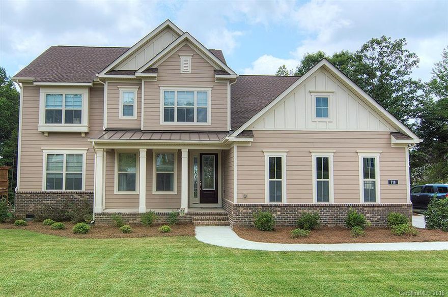 Better than new, this lovely home has a Master Suite on main w/2 walk-in custom closets.  Create meals in a spacious kitchen w/granite counter tops,huge island, double ovens & gas cook top. A loft AND a bonus room provide flex space options. One secondary bedroom is an en-suite with french doors.  Open floor plan & screened porch for you to enjoy the view of a large yard w/irrigation. Lovely window treatments, upgraded light fixtures, media closet & gas grill line are just a few extras.