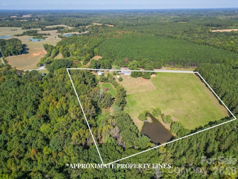 Photo of 7615 S Rocky River Road, Monroe, NC 28112 (MLS # 4430607)