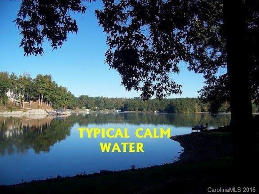 This is a STATE REGISTERED MODULAR home on almost 1 acre level. Catawba County has it listed as manufactured home which is incorrect. Extreme privacy Very Large quiet cove 2,000 feet from main channel. RARE boat launch 2nd dock, Neighborhood of high end homes. Outdoor entertainment areas Interior + Exterior meticulously maintained Lake views from bedrooms. 2 car garage with workshop, out buildings. Wood burning fireplace. Separate laundry room. Tile and granite. Call listing agent to show.