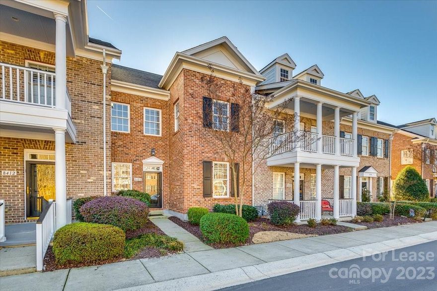 2 story, full brick TH w/granite countertops, S.S. appliances, crown molding, HDWD floors thru out downstairs, private fenced garden space. All BR upstairs, Master ensuite has 2 large walk-in closets, garden tub & spacious stall shower & dual vanities. Laundry room upstairs has utility tub. 2 car detached garage. Across from movies, dining, shopping! Water, trash, washer & dryer included in rent.