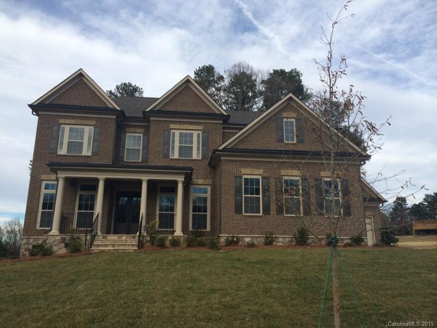 Full brick elevation with stone accents & porch. Cook's kitchen w/large center island open to Keeping Room. Guest suite & separate study on main level. Private 2nd floor owner's suite w/luxury spa bath. Unfinished 3rd floor walk-up ready for expansion. 3 car tandem garage with lots of extra storage.  Fenced rear yard with designer landscape package.