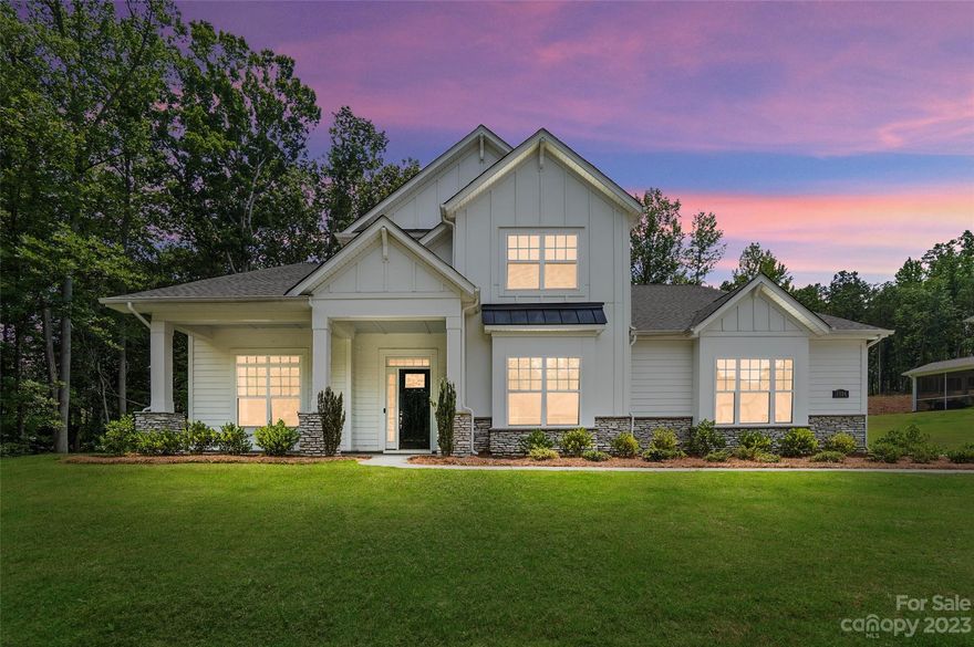 Welcome to your dream home in Indian Land! Nestled on a large lot, this stunning home boasts over 4000 square feet of exquisite living space, featuring 4 spacious bedrooms and 4 and a half bathrooms. The main level of this home showcases a beautifully designed floor plan, where you'll find the primary bedroom. The primary bathroom features modern fixtures, a luxurious soaking tub, a separate shower, and dual vanities. Upstairs, you'll discover a bonus room and a loft area. The heart of the home is the stylishly appointed kitchen, featuring sleek quartz countertops and state-of-the-art appliances. One of the standout features of this home is the brand new screened-in porch, providing a serene space to enjoy the outdoors. Located in the coveted Indian Land school district, this home offers access to top-tier educational opportunities. Additionally, the community has a clubhouse and pool, perfect for relaxation and recreation.