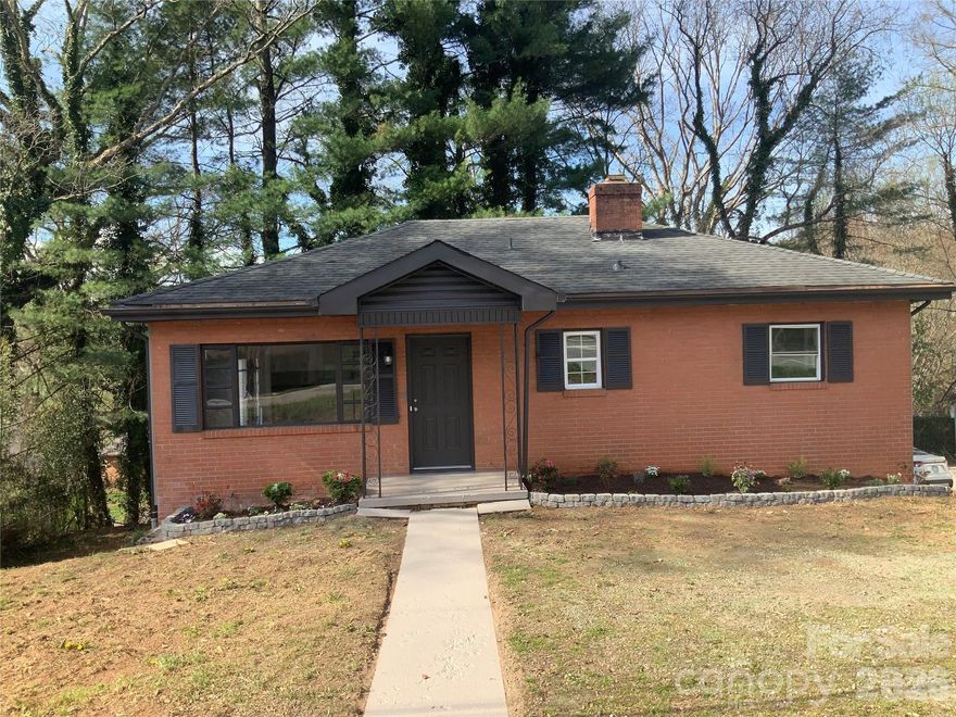 GREAT LOCATION!!!!  Beautiful four bedroom/two bath home conveniently located in the popular West Asheville area . This home has been extensively remodeled; which includes , new floors, a completely remodeled kitchen and bathrooms. The home has also been freshly painted.
Located in a residential and commercial zone. Don't miss the opportunity to become homeowners of a beautiful property.