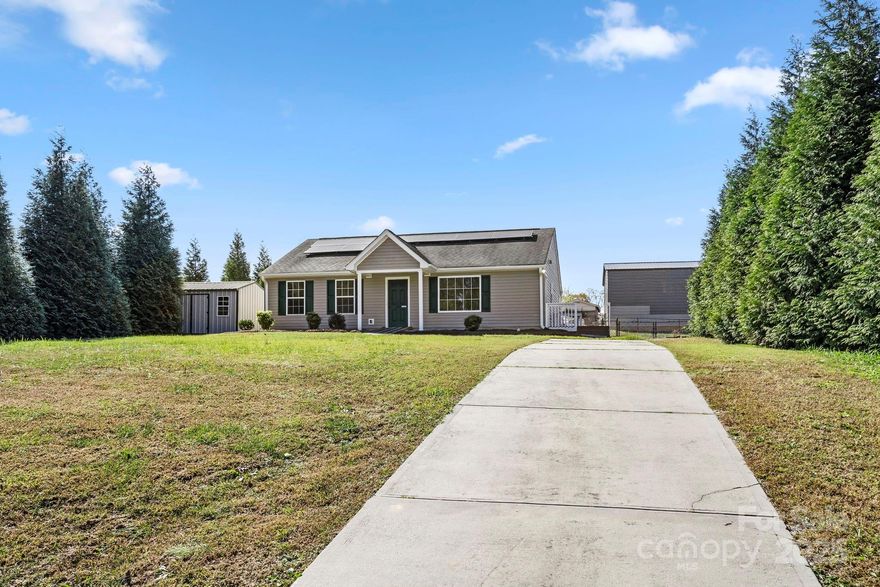 This well maintained 1,218 square feet home offers the perfect balance of comfort, convenience, and space.  The home is situated in an established neighborhood just outside of the city limits, while still being close to all the amenities that Kings Mountain and Shelby have to offer. The home features three spacious bedrooms and two full bathrooms, providing lots of room. The interior of the home has laminated wood flooring with freshly painted walls and new carpet installed in two bedrooms. The Heat Pump and water heater were installed in 2024. Outside you have a concrete driveway, fenced backyard, outbuilding and a concrete pad on the side yard. The home is move-in ready. The home also has a full solar panel system to help lower electric bills and conserve energy. Don’t miss the opportunity to own this charming home. Schedule a showing today to see everything it has to offer!