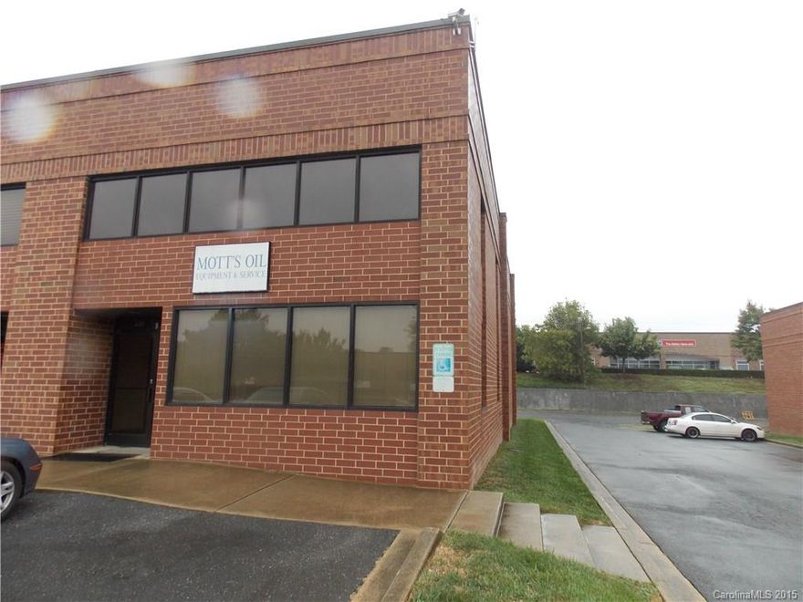 End unit brick condo in Halifax Station.  Front office space, rear warehouse space with a single loading bay door.  Additional mezzanine office area on a partial second floor.  Being sold AS-IS.