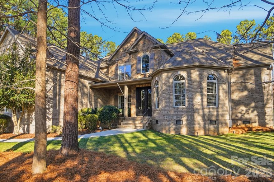 Stunning full brick home offering over 4,500 square feet of thoughtfully designed living space on a private 0.69-acre lot. Built in 2012 and meticulously maintained, this residence features 4 bedrooms plus two bonus rooms, providing exceptional flexibility for home offices, guest suites, or recreation space. The convenient main-level primary suite is complemented by hardwood flooring on the main level and upstairs hallways and lake views from the front porch.

Premium upgrades include a RainSoft water purification system, a variable-speed well pump maintaining constant 70 PSI water pressure, a whole-house humidifier, and a crawl space enhanced with a new 20-mil vapor barrier and updated insulation. The garage features a durable epoxy-coated floor, offering both durability and a polished finish.

The perfectly flat, fully fenced backyard is ideal for entertaining and is already configured for a future swimming pool. A covered patio with paver stones and a natural gas line makes outdoor living effortless. The community pool is located just down the street, and boating enthusiasts will appreciate the home’s proximity to public boat launch areas and the boat club at Stutts Marina.

With its combination of full brick construction, modern amenities, flexible living space, and a prime Lake Norman location, this home presents an exceptional opportunity for buyers seeking quality, space, and lifestyle convenience.