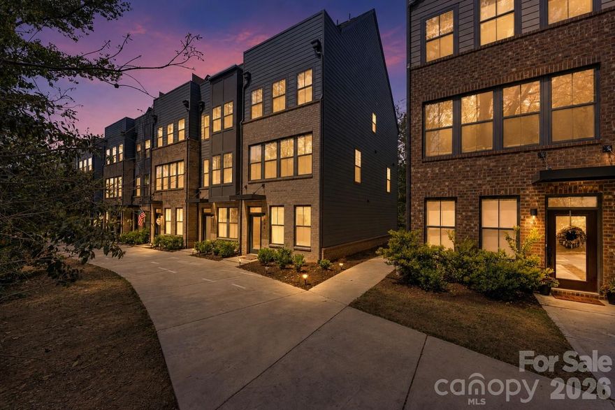 Welcome to 336 Twinflower Lane, a stunning 4 bedroom 4.5 bath modern townhome in the heart of Charlotte’s vibrant NoDa Arts District. Designed for both elevated living and effortless entertaining, this home perfectly captures the energy and creativity that make NoDa one of the city’s most sought after neighborhoods.

Step inside to discover a light filled open concept layout with clean lines, high ceilings, and contemporary finishes throughout. The main living space flows seamlessly into a stylish kitchen featuring sleek countertops, generous cabinetry, and a large island ideal for hosting or everyday living.

The home features four spacious bedrooms, three of which include private en suite baths, offering exceptional comfort and flexibility for guests, roommates, or a work from home lifestyle. The lower level bedroom includes a full bath just outside the room, providing convenience and privacy without en suite access.

The top floor bedroom and flex space opens directly to the rooftop terrace, creating a rare and seamless indoor outdoor living experience. This flexible space also features a built in desk nook, making it ideal for a home office, creative studio, or guest retreat, all while offering direct access to the showstopping rooftop terrace.

The rooftop terrace steals the spotlight offering the perfect setting for entertaining, unwinding, or taking in Charlotte’s skyline views. Whether it is sunset cocktails or weekend gatherings, this space defines indoor outdoor living at its best.

Located just steps from NoDa’s eclectic mix of breweries, restaurants, art galleries, and live music venues, you will experience a lifestyle that is as dynamic as it is convenient. Plus, easy access to Uptown and the light rail makes commuting a breeze.

336 Twinflower Lane is not just a home it is a lifestyle.