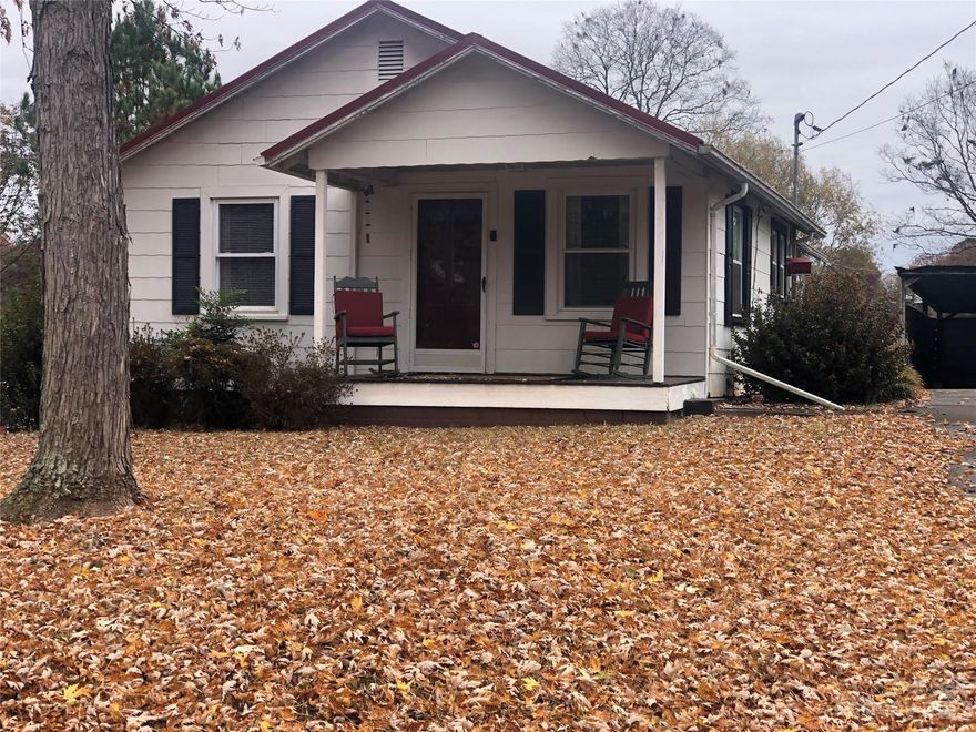 Country living, yet convenient to amenities. Relax with your morning coffee on the covered front porch and enjoy the sounds of birds signing.  This two bedroom, one bath home bungalow is ready for your personal touch.  Nearly one acre lot cleared, two car carport and two storage buildings.      Just minutes to the town of Maiden  and an easy commute to Hickory, Lincolnton and Newton.