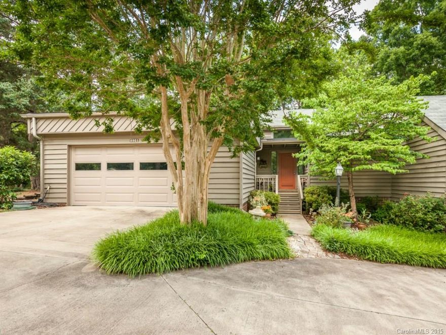 Remarkable townhouse located on corner lot w/ incredible Golf Course views! Brand new Kitchen & hall bath w/ new carpet in spacious bedrooms, living, & den.  Wonderful gas log fireplace.  New sliding glass doors that lead out to the spacious back & side decks, both power washed & stained! Energy efficient window film on several windows & doors w/ energy saving "wrap" in attic. Oversized garage w/ workbench.  Other updates include HVAC, light & plumbing fixtures, & ceiling fans. A must see!